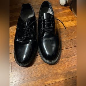 shiny pointed toe loafers